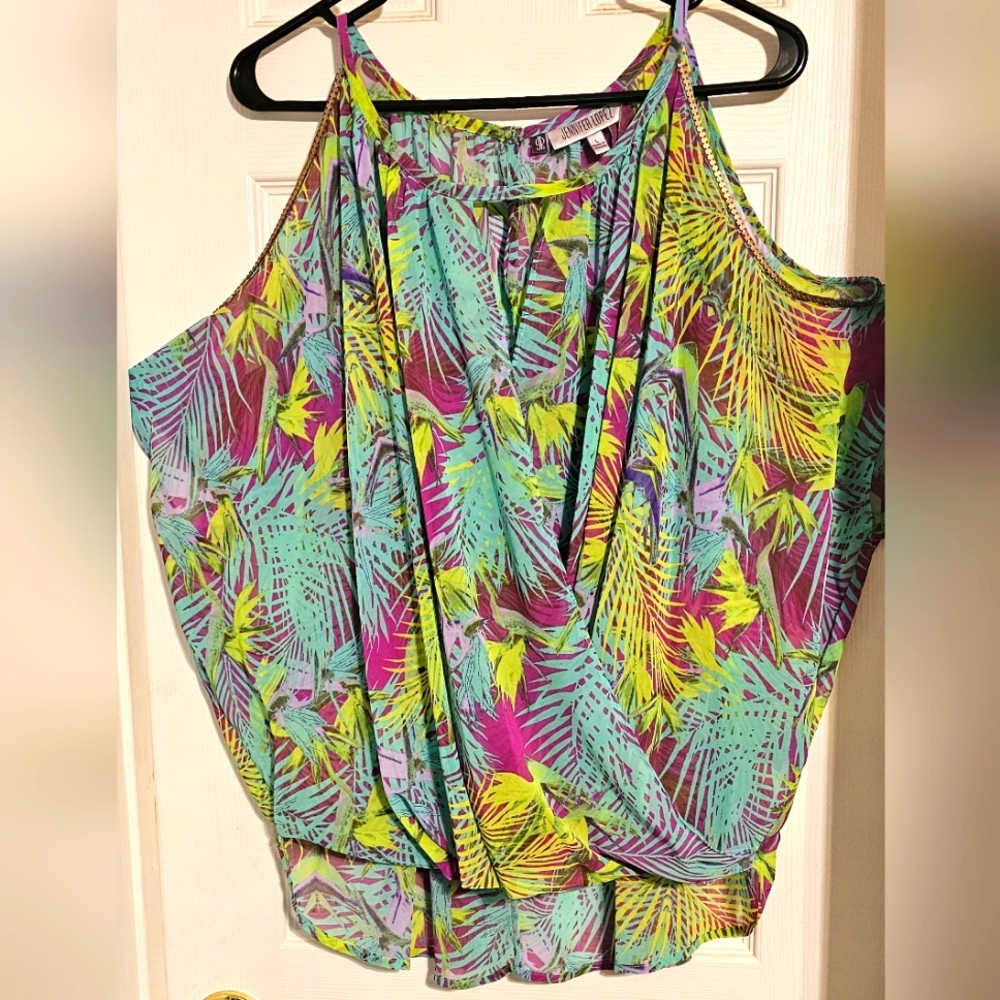 Jennifer Lopez open shoulder wrap front sheer blouse